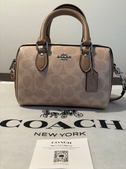 Borsa a tracolla COACH Mini Rowan Crossbody in tela Signature