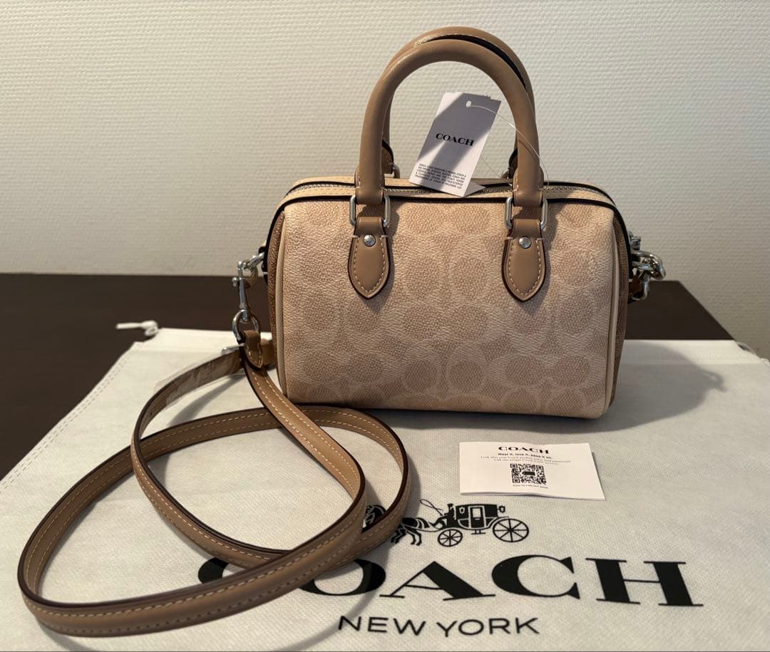Borsa a tracolla COACH Mini Rowan Crossbody in tela Signature