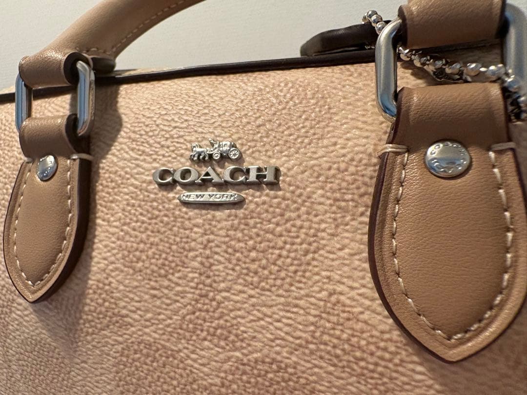 Borsa a tracolla COACH Mini Rowan Crossbody in tela Signature