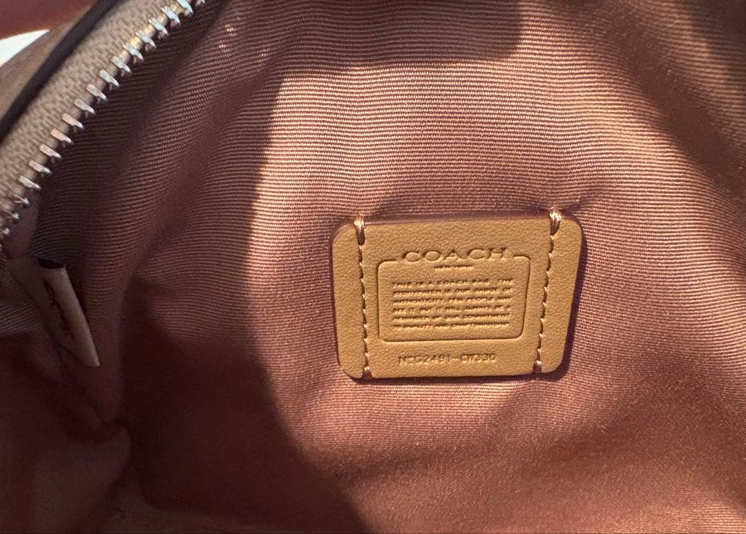 Borsa a tracolla COACH Mini Rowan Crossbody in tela Signature
